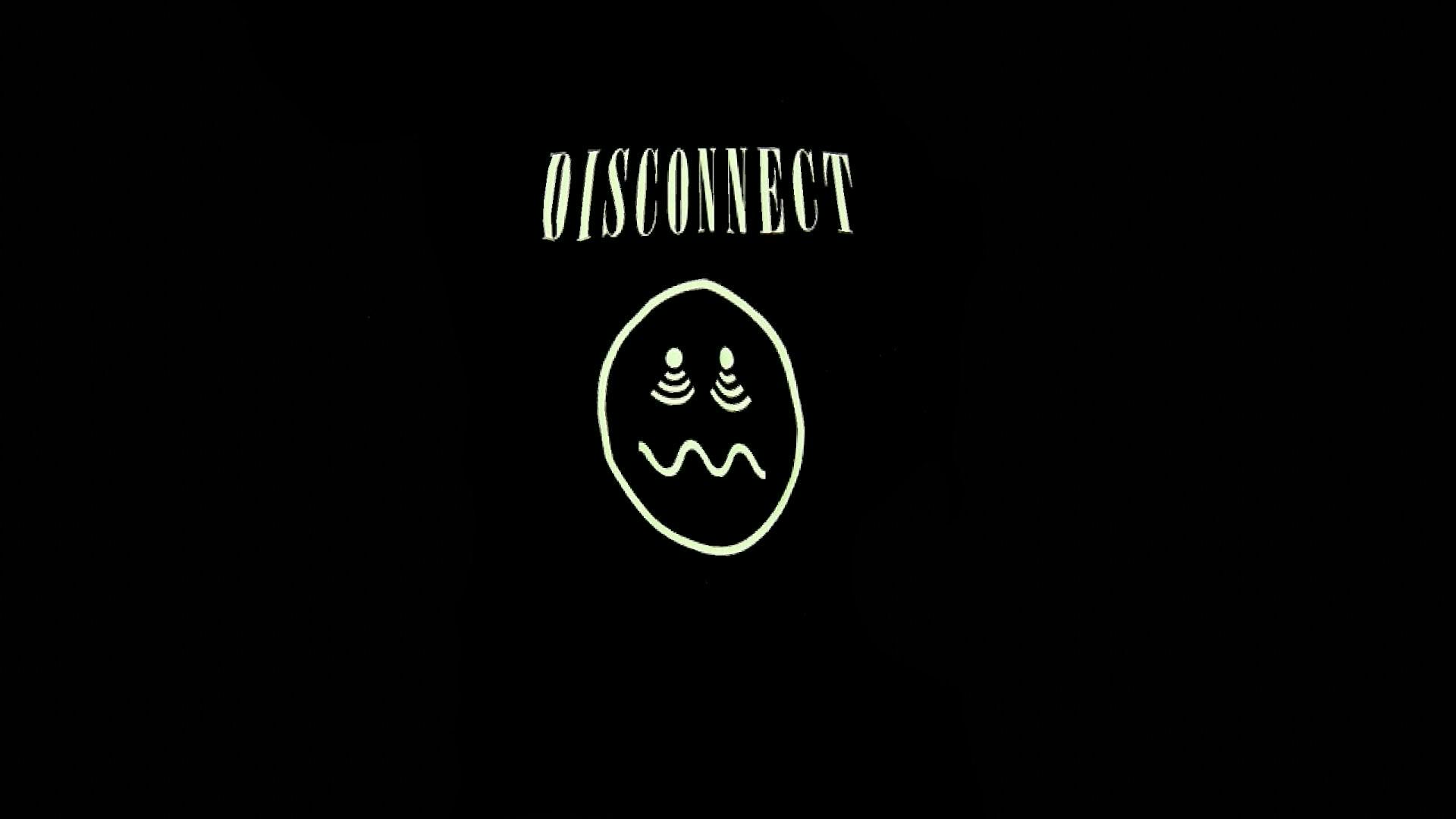 Ett förvrängt t-shirt-tryck med en "disconnectad" smiley.